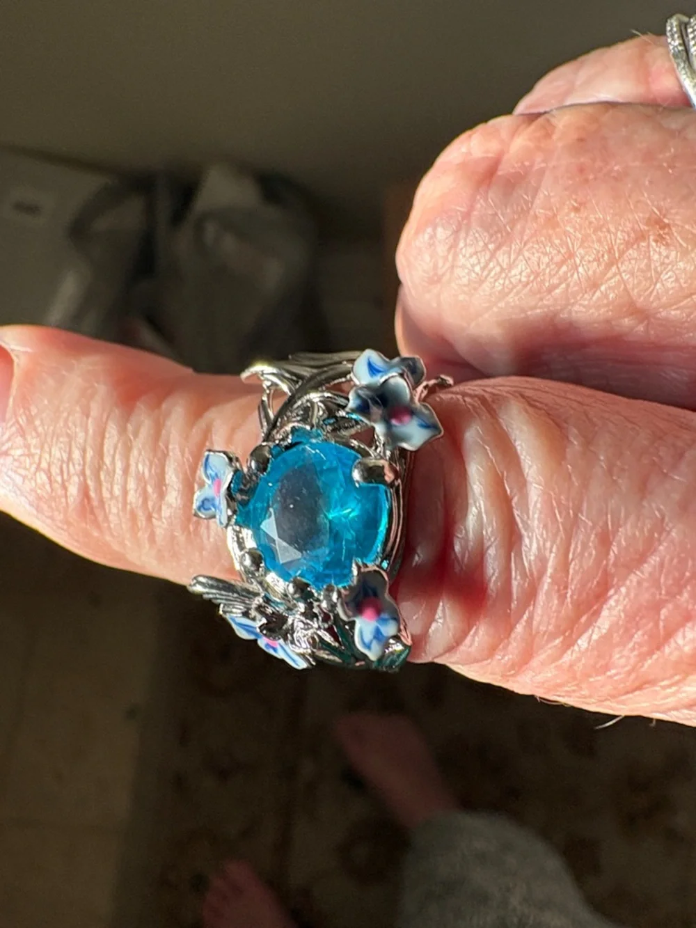 Elegant Silver and Blue Floral Ring